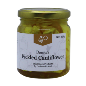 Jar of gluten-free pickled cauliflower with cauliflower, vinegar, and spices, perfect for antipasto platters or salads.