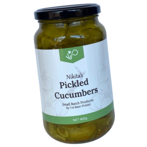 Jar of crisp, tangy pickled cucumbers made with New Zealand-grown produce, perfectly spiced and ideal with Swedish meatballs or hearty dishes.